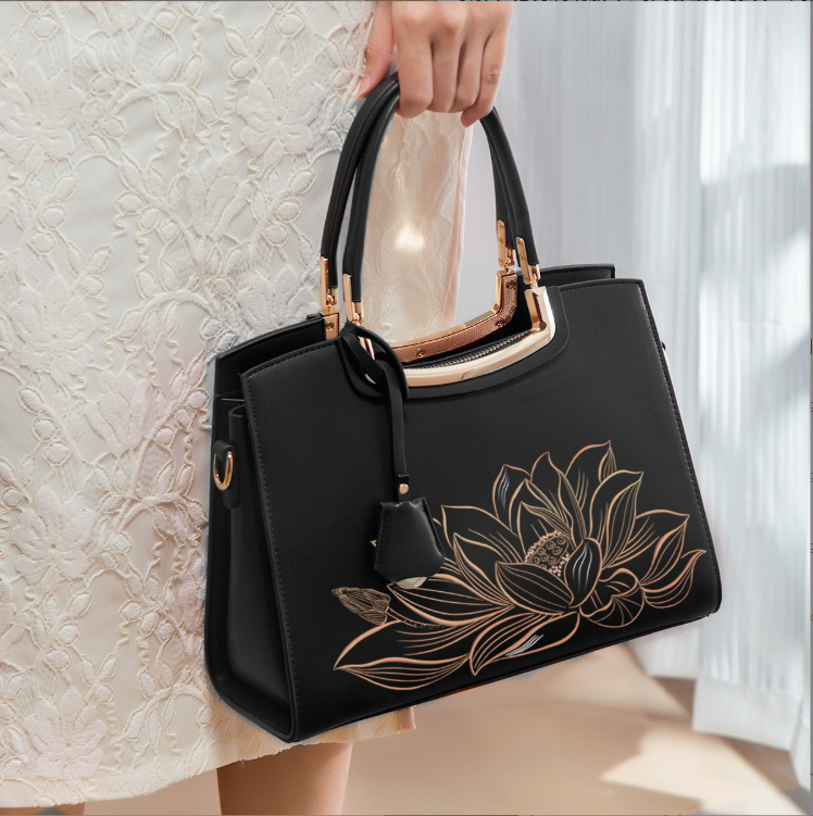 Ladies Elegant Burgundy Handbag with Floral Embroidery And Gold-Tone Hardware